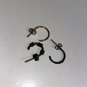 3 cartilage piercing rings. Funky and fun.